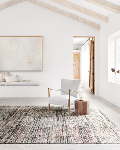 The Theia THE-08 Grey / Multi Area Rug pairs elegant grey and vibrant multi-toned tones with a power-loomed polyester pile and rayon area rug for lasting style