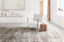The Theia THE-08 Grey / Multi Area Rug pairs elegant grey and vibrant multi-toned tones with a power-loomed polyester pile and rayon area rug for lasting style