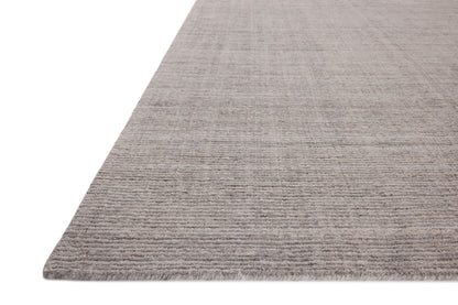 The Thorne THT-01 Grey Area Rug delivers elegant grey beauty in a hand-loomed polyester area rug