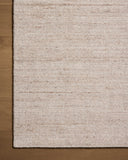 Designed in warm natural hues, the Thorne THT-01 Natural Area Rug is a hand-loomed polyester area rug that stands out