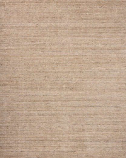 The Thorne THT-01 Sand Area Rug combines sandy tones with a hand-loomed polyester area rug for effortless elegance