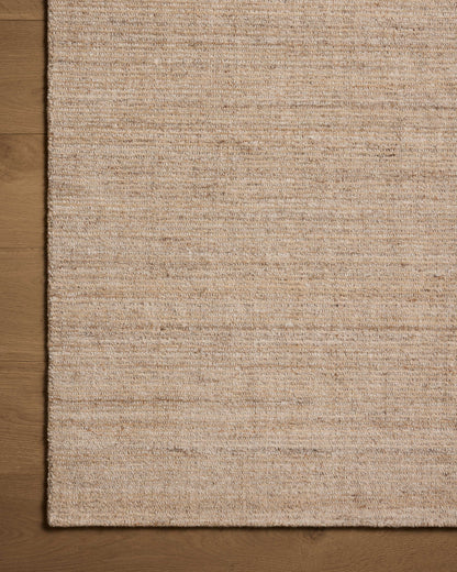 The Thorne THT-01 Sand Area Rug combines sandy tones with a hand-loomed polyester area rug for effortless elegance