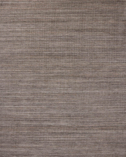 A hand-loomed polyester area rug with grounding stone tones, the Thorne THT-01 Stone Area Rug adds character to any room