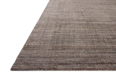 A hand-loomed polyester area rug with grounding stone tones, the Thorne THT-01 Stone Area Rug adds character to any room