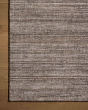 A hand-loomed polyester area rug with grounding stone tones, the Thorne THT-01 Stone Area Rug adds character to any room