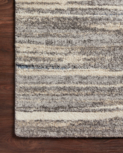 Crafted as a power-loomed polypropylene and polyester area rug, the Theory THY-01 Mist / Beige Area Rug brings soft misty and warm beige warmth and transitional character to your space