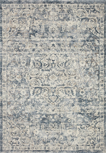 With refined ivory and calming blue hues and transitional styling, the Theory THY-02 Ivory / Blue Area Rug is a power-loomed polypropylene and polyester area rug that elevates any room