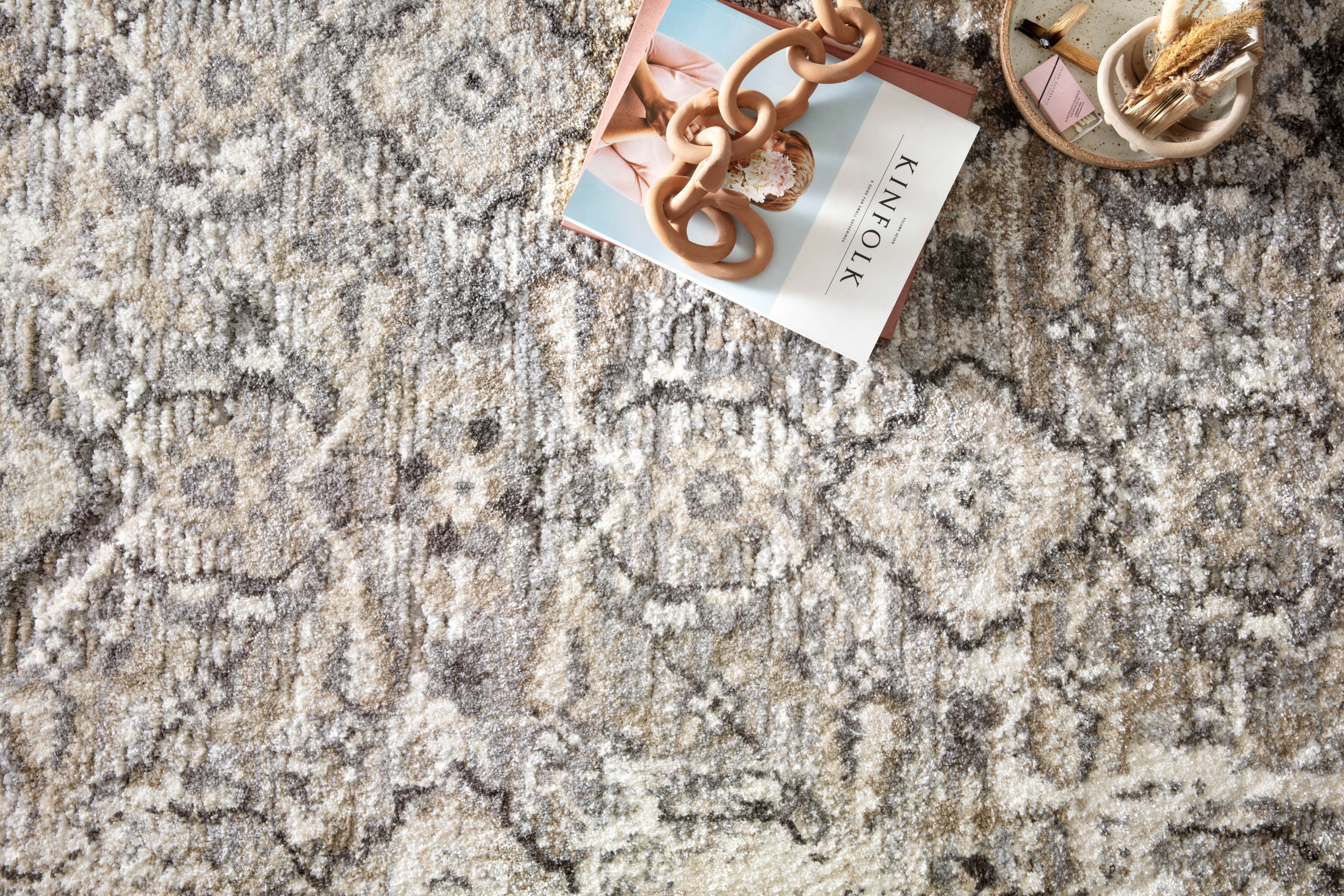 The Theory THY-03 Natural / Grey Area Rug blends warm natural and elegant grey tones and transitional motifs into a power-loomed polypropylene and polyester area rug with timeless appeal