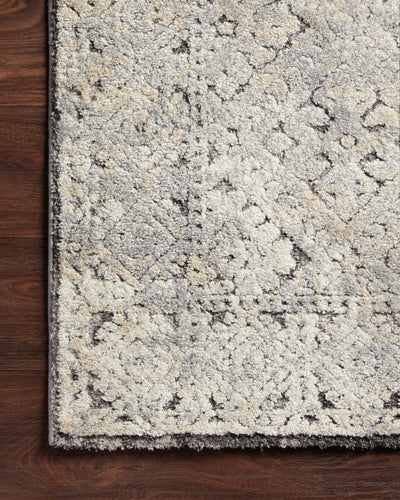 The Theory THY-05 Grey / Sand Area Rug delivers elegant grey and sandy beauty and transitional elegance in a power-loomed polypropylene and polyester area rug