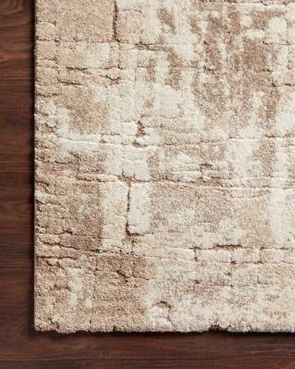The Theory THY-07 Beige / Taupe Area Rug combines warm beige and versatile taupe tones and transitional patterns in a power-loomed polypropylene and polyester area rug for effortless elegance