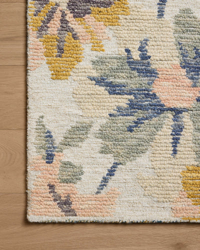 Crafted as a hand-tufted wool area rug, the Tilly TIL-03 Bone / Multi Area Rug brings bone and vibrant multi-toned warmth and floral and high-low textured character to your space