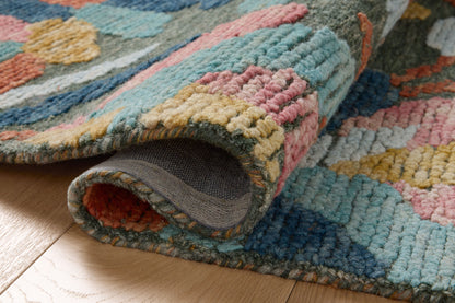 The Tilly TIL-05 Green / Multi Area Rug blends green and vibrant multi-toned tones and floral and high-low textured motifs into a hand-tufted wool area rug with timeless appeal