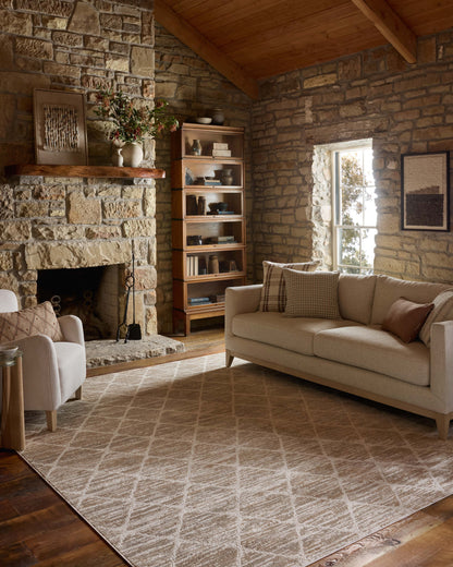 A stunning power-loomed polyester area rug with abstract detail, the Townes TOW-01 Pebble / Beige Area Rug features subtle pebble and warm beige tones for a polished look