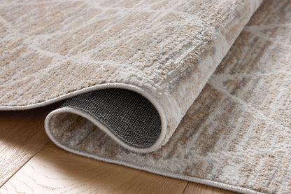 A stunning power-loomed polyester area rug with abstract detail, the Townes TOW-01 Pebble / Beige Area Rug features subtle pebble and warm beige tones for a polished look