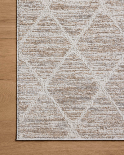 A stunning power-loomed polyester area rug with abstract detail, the Townes TOW-01 Pebble / Beige Area Rug features subtle pebble and warm beige tones for a polished look