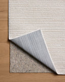 The Townes TOW-02 Beige / Ivory Area Rug delivers warm beige and refined ivory beauty and abstract elegance in a power-loomed polyester area rug