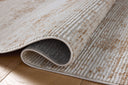Designed with abstract artistry in sandy and warm beige hues, the Townes TOW-03 Sand / Beige Area Rug is a power-loomed polyester area rug that stands out