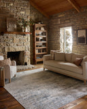 The Townes TOW-04 Ivory / Sky Area Rug combines refined ivory and breezy sky-blue tones and abstract patterns in a power-loomed polyester area rug for effortless elegance