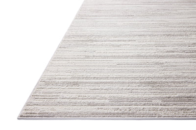 A power-loomed polyester area rug featuring abstract design and warm beige and elegant grey tones, the Townes TOW-05 Beige / Grey Area Rug adds character to any room
