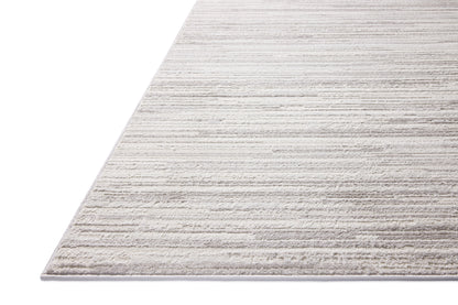 A power-loomed polyester area rug featuring abstract design and warm beige and elegant grey tones, the Townes TOW-05 Beige / Grey Area Rug adds character to any room
