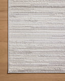 A power-loomed polyester area rug featuring abstract design and warm beige and elegant grey tones, the Townes TOW-05 Beige / Grey Area Rug adds character to any room