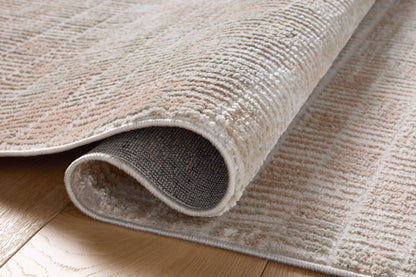 Rich in warm beige and earthy clay hues with abstract detail, the Townes TOW-06 Beige / Clay Area Rug is a power-loomed polyester area rug built for style and comfort