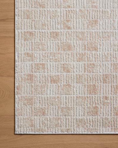 Rich in warm beige and earthy clay hues with abstract detail, the Townes TOW-06 Beige / Clay Area Rug is a power-loomed polyester area rug built for style and comfort