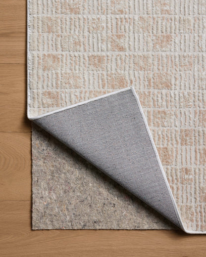 Rich in warm beige and earthy clay hues with abstract detail, the Townes TOW-06 Beige / Clay Area Rug is a power-loomed polyester area rug built for style and comfort
