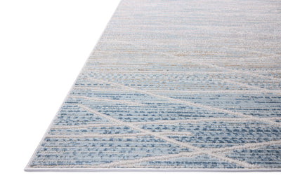 The Townes TOW-07 Natural / Sky Area Rug offers warm natural and breezy sky-blue sophistication and abstract charm in a power-loomed polyester area rug