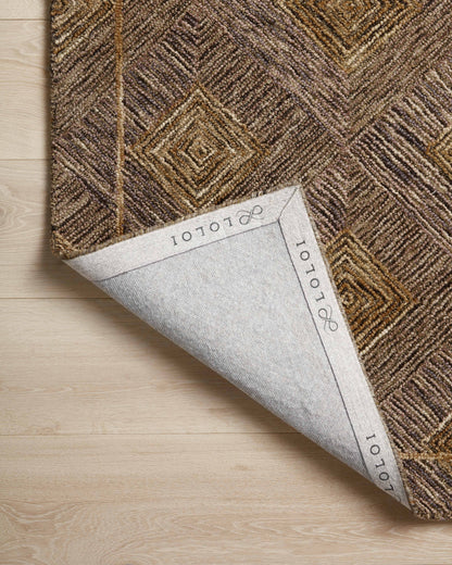 A hand-tufted 100% wool area rug with graphic design in regal plum and radiant gold hues, the Varena VAR-04 Plum / Gold Area Rug is a standout in any décor