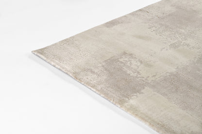 Momeni Vera VRA-4 Ivory Area Rug, a contemporary rug with a distressed patchwork design