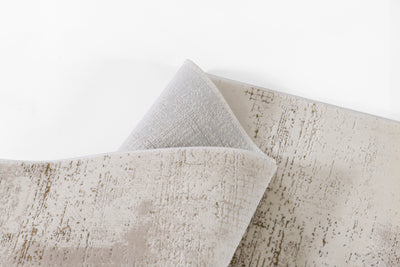 Momeni Vera VRA-4 Ivory Area Rug, a contemporary rug with a distressed patchwork design