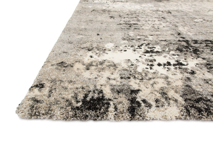 Dressed in elegant grey hues with contemporary and vintage detail, the Viera VR-04 Grey Area Rug is a power-loomed polypropylene and polyester area rug that completes any room