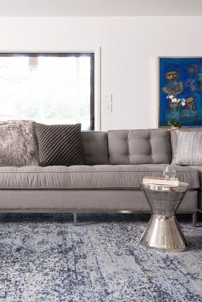 The Viera VR-06 Lt. Blue / Grey Area Rug transforms any space with light blue and elegant grey tones and contemporary and vintage design in a power-loomed polypropylene and polyester area rug