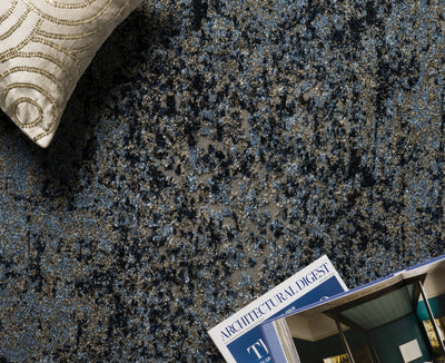A power-loomed polypropylene and polyester area rug in elegant grey and classic navy tones with contemporary and vintage motifs, the Viera VR-07 Grey / Navy Area Rug grounds your room beautifully