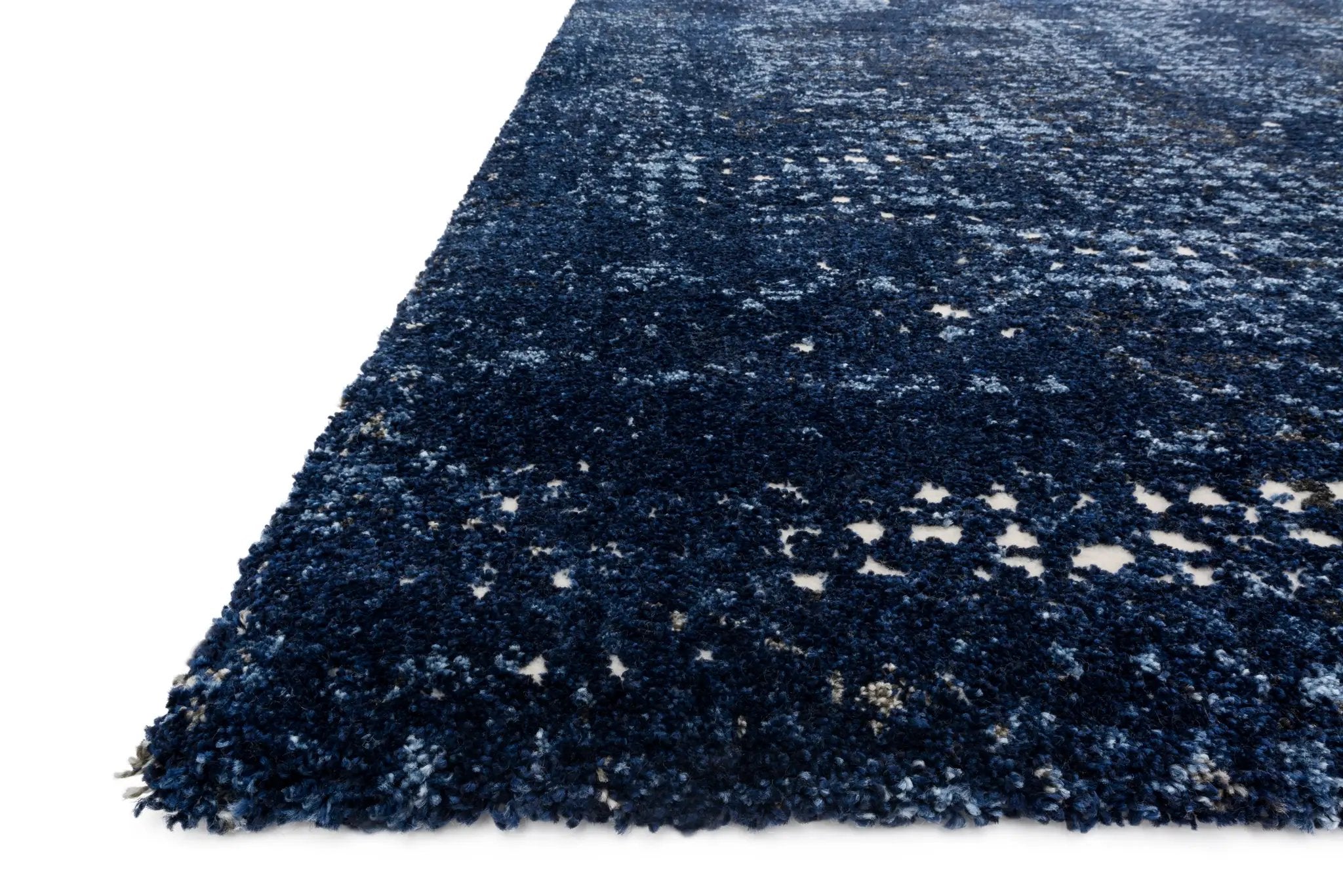 The Viera VR-08 Dark Blue / Light Blue Area Rug is a power-loomed polypropylene and polyester area rug that radiates dark blue and light blue charm and contemporary and vintage elegance