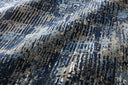 Layered in dark blue and elegant grey hues with contemporary and vintage patterns, the Viera VR-09 Dark Blue / Grey Area Rug is a power-loomed polypropylene and polyester area rug perfect for any setting
