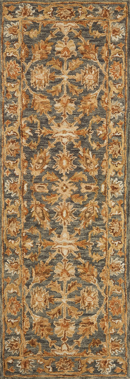 With cool slate and cool slate hues and traditional styling, the Victoria VK-05 Slate / Slate Area Rug is a hooked 100% wool area rug that elevates any room