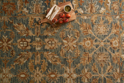 With cool slate and cool slate hues and traditional styling, the Victoria VK-05 Slate / Slate Area Rug is a hooked 100% wool area rug that elevates any room