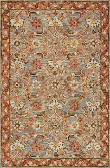 The Victoria VK-10 Slate / Terracotta Area Rug combines cool slate and rich terracotta tones and traditional patterns in a hooked 100% wool area rug for effortless elegance