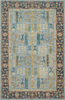 A hooked 100% wool area rug featuring traditional design and lt blue and dk blue tones, the Victoria VK-12 Lt Blue / Dk Blue Area Rug adds character to any room