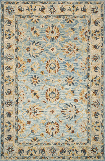 The Victoria VK-18 Lt. Blue / Natural Area Rug highlights light blue and warm natural tones and traditional texture in a beautifully made hooked 100% wool area rug