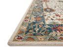 Layered in refined ivory and breezy sky-blue hues with traditional patterns, the Victoria VK-23 Ivory / Sky Area Rug is a hooked 100% wool area rug perfect for any setting
