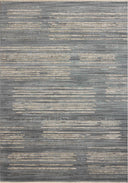 A power-loomed 100% polyester area rug with abstract and linear flair in serene ocean and sandy tones, the Wade WAE-02 Ocean / Sand Area Rug anchors any room
