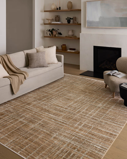 The Wade WAE-03 Clay / Silver Area Rug pairs earthy clay and shimmering silver tones and abstract and linear patterns in a power-loomed 100% polyester area rug