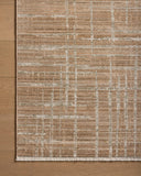 The Wade WAE-03 Clay / Silver Area Rug pairs earthy clay and shimmering silver tones and abstract and linear patterns in a power-loomed 100% polyester area rug