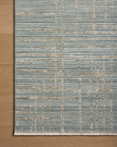With spa and sandy hues and abstract and linear styling, the Wade WAE-03 Spa / Sand Area Rug is a power-loomed 100% polyester area rug that elevates any room