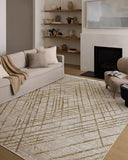 The Wade WAE-04 Beige / Gold Area Rug blends warm beige and radiant gold tones and abstract and linear motifs into a power-loomed 100% polyester area rug with timeless appeal
