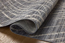 A stunning power-loomed 100% polyester area rug with abstract and linear detail, the Wade WAE-04 Midnight / Beige Area Rug features dramatic midnight and warm beige tones for a polished look