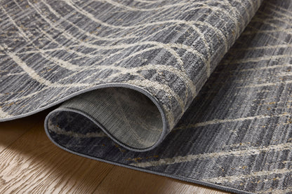 A stunning power-loomed 100% polyester area rug with abstract and linear detail, the Wade WAE-04 Midnight / Beige Area Rug features dramatic midnight and warm beige tones for a polished look